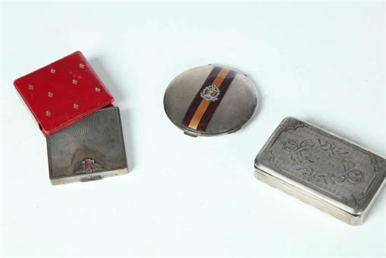 Appraisal: THREE SILVER COMPACTS Includes a mid th century box marked