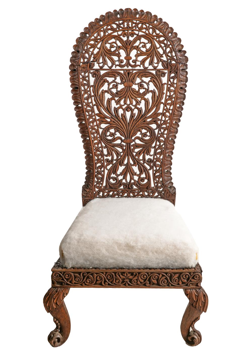 Appraisal: ANGLO-INDIAN CARVED LOW CHAIRwith removable seat needs upholstery inches wide