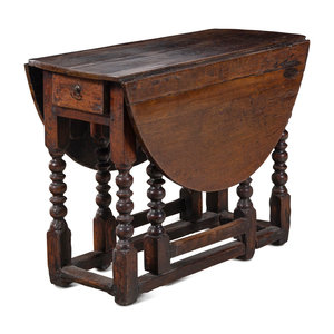 Appraisal: A William and Mary Carved Oak Gate-Leg and Drop-Leaf Table