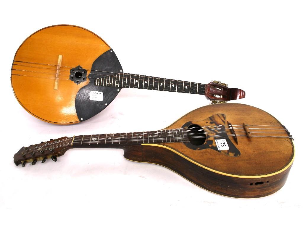 Appraisal: Early th century pear shaped flatback mandolin the closed peg