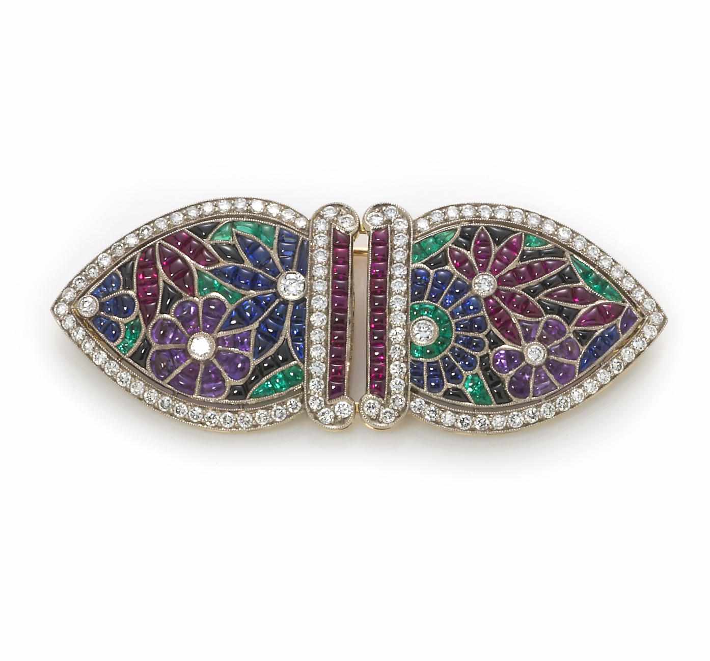 Appraisal: A diamond and gem-set floral motif double-clip brooch composed of