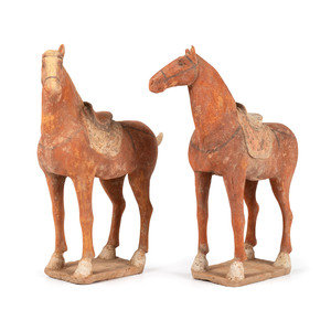 Appraisal: A Pair of Chinese Terracotta Horses with polychrome decoration Height