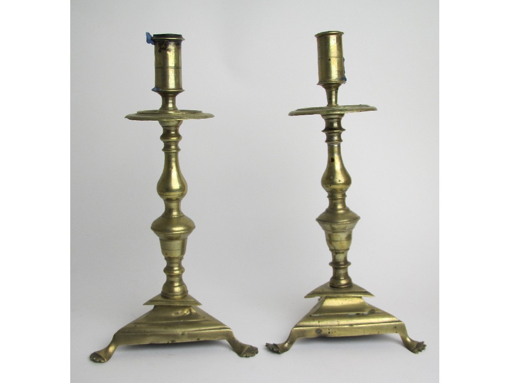 Appraisal: Two Dutch brass candl