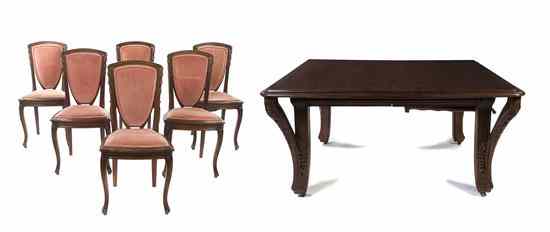 Appraisal: A French Art Nouveau Carved Dining Suite Louis Majorelle -