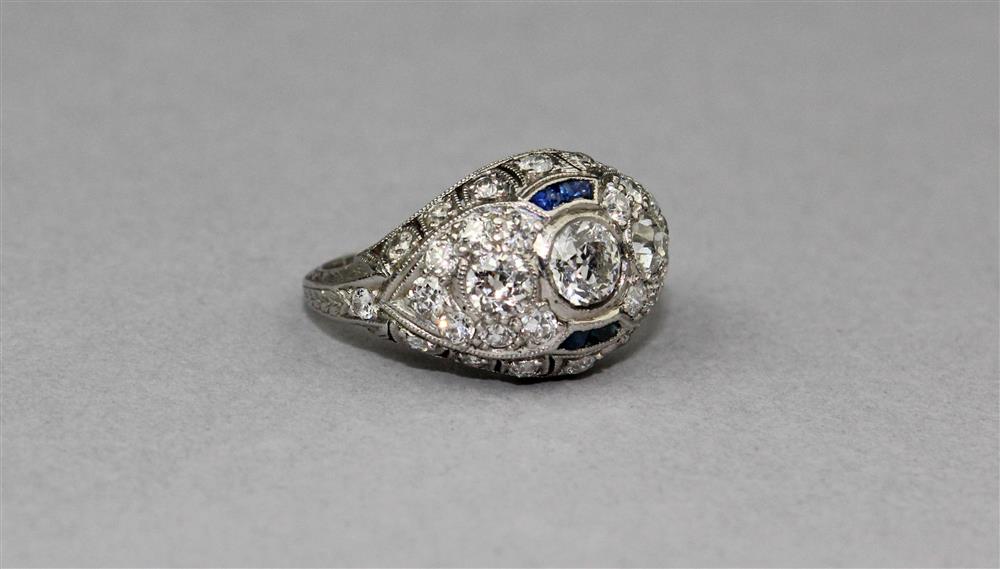 Appraisal: VINTAGE PLATINUM AND DIAMOND RING WITH BLUE SAPPHIRES the vintage