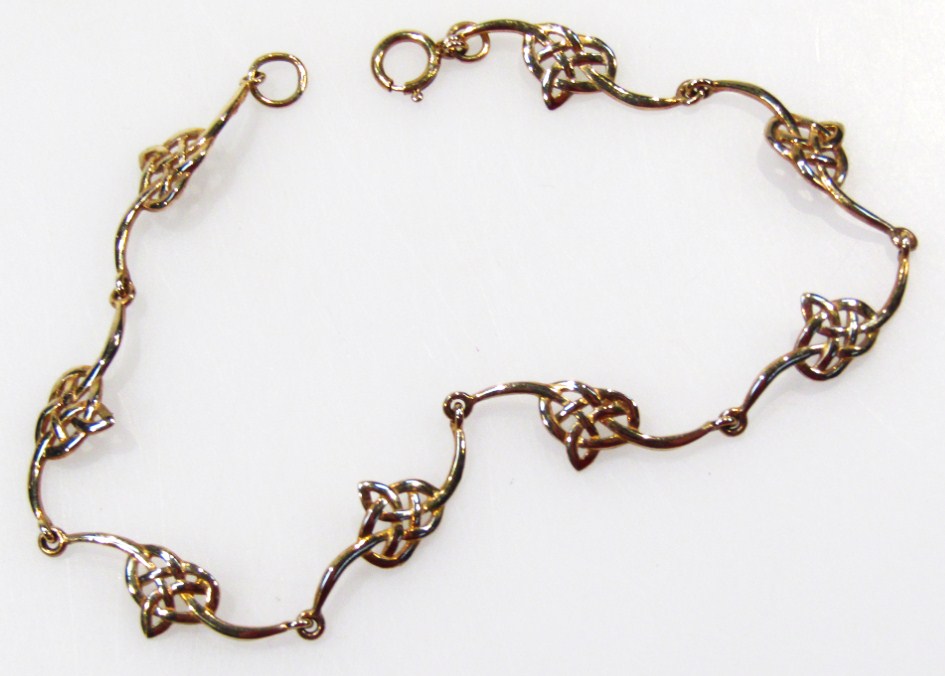 Appraisal: A ct gold fancy link child's bracelet of part pierced