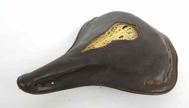 Appraisal: Saddle cover with reed center