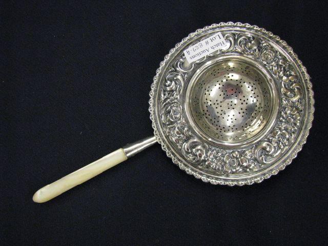 Appraisal: Mauser Victorian Sterling Silver Tea Strainer floral repousse mother-of-pearl handle