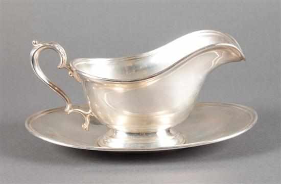 Appraisal: American sterling silver gravy boat and tray in the ''Lord