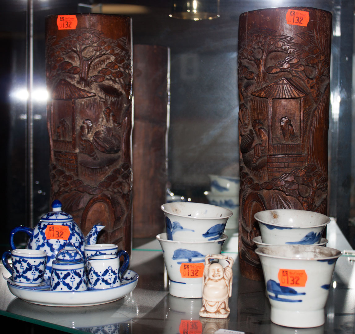 Appraisal: Carved wood and porcelain items including pair of carved wood