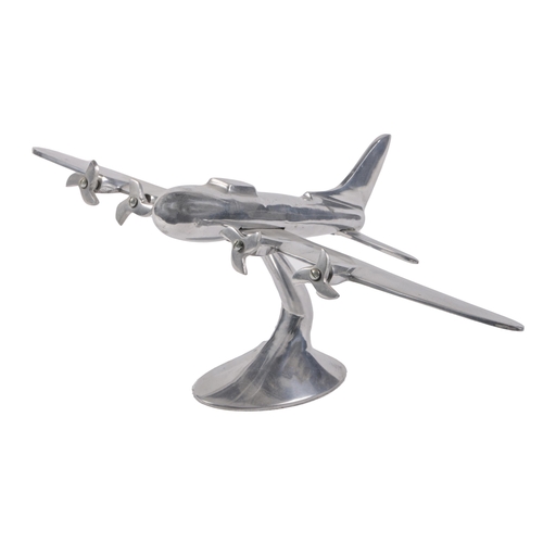 Appraisal: A cast aluminium model of a stylised four-engine turbo-prop aeroplane