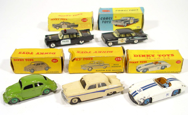 Appraisal: Four boxed Dinky Toys cars USA police car Volkswagon Cunningham