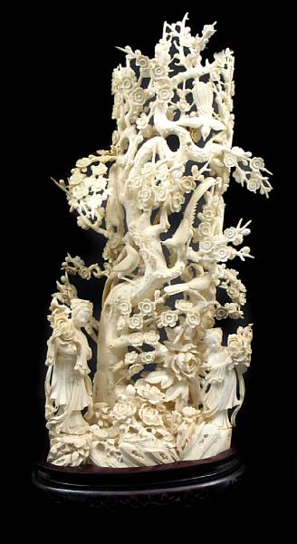 Appraisal: A Chinese tinted ivory covered vase with tree motif th