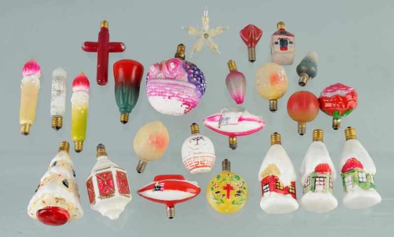 Appraisal: Lot of Christmas Figure Light Bulbs Description Includes flowers house