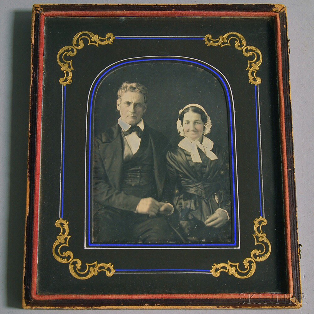 Appraisal: Half-plate Daguerreotype Portrait of an Elderly Couple the couple sitting