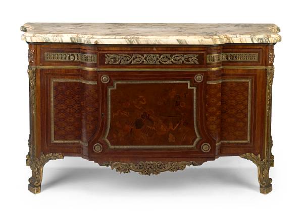 Appraisal: A Louis XVI style gilt bronze mounted marquetry commode after