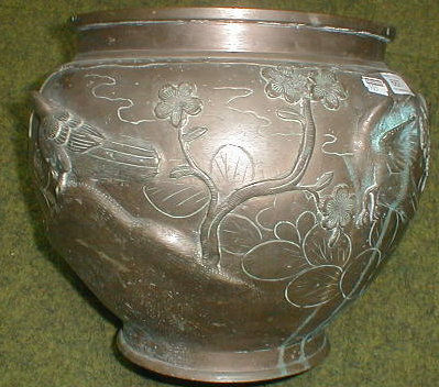 Appraisal: A thC Japanese bronze jardiniere decorated and cast in relief