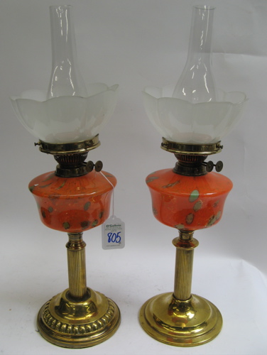 Appraisal: PAIR OF ENGLISH KEROSENE TABLE LAMPS brass base with orange