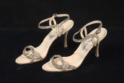 Appraisal: Manolo Blahnik lizard skin high heel sandals Strappy design in