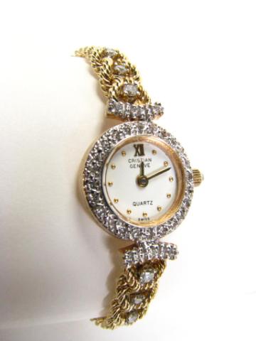 Appraisal: K yellow gold Christian Geneve Swiss diamond bezel watch ''