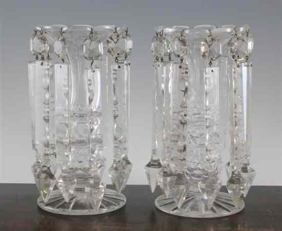 Appraisal: A pair of Victorian cut glass table lustres the trumpet