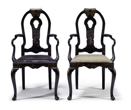 Appraisal: Pair of Queen Anne style chinoiserie decorated ebonized armchairs The