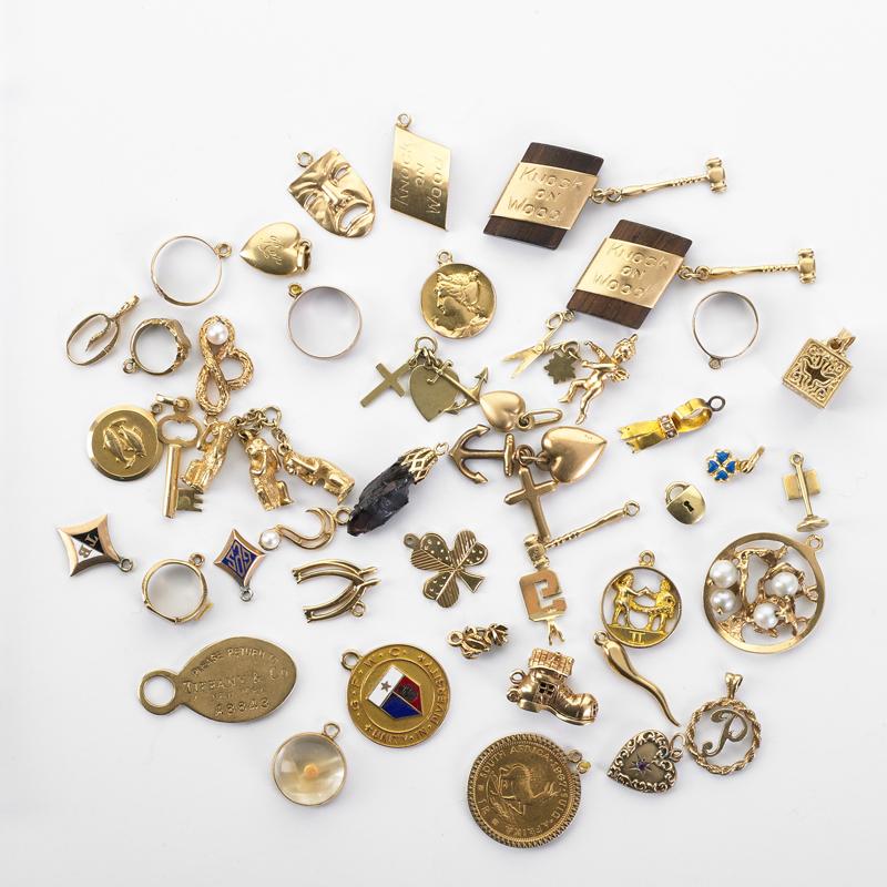 Appraisal: FORTY-FOUR THEMED NOVELTY YELLOW GOLD CHARMS Condition Report