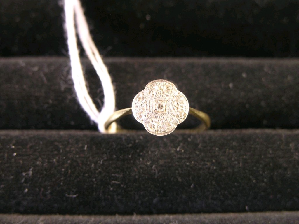 Appraisal: A gold and diamond cluster ring central small diamond surrounded