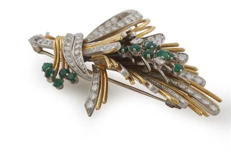 Appraisal: A mid th century emerald and diamond set brooch of