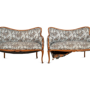 Appraisal: A Pair of Art Nouveau Style Walnut Settees th Century