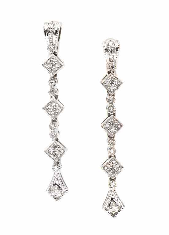 Appraisal: A Pair of Karat White Gold and Diamond Earrings containing