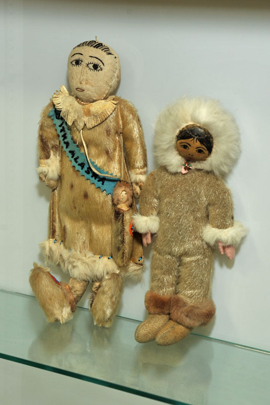 Appraisal: TWO ALASKA ESKIMO DOLLS Including one folksy Eskimo doll with