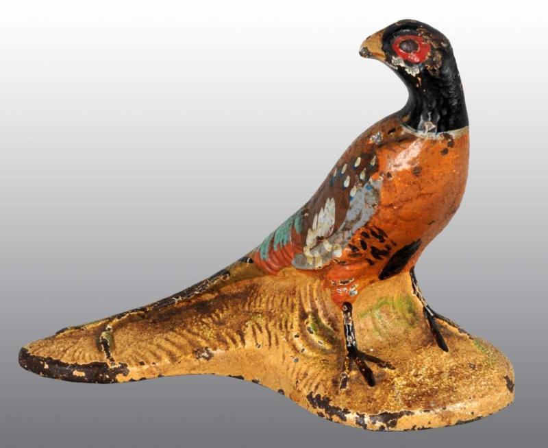 Appraisal: Cast Iron Pheasant Paperweight Description Made by Hubley cat Condition