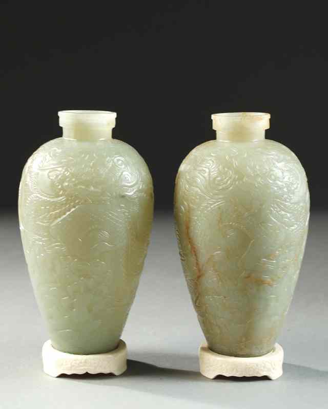 Appraisal: PAIR NEPHRITE JADE VASES in celadon green with shallow sculpted