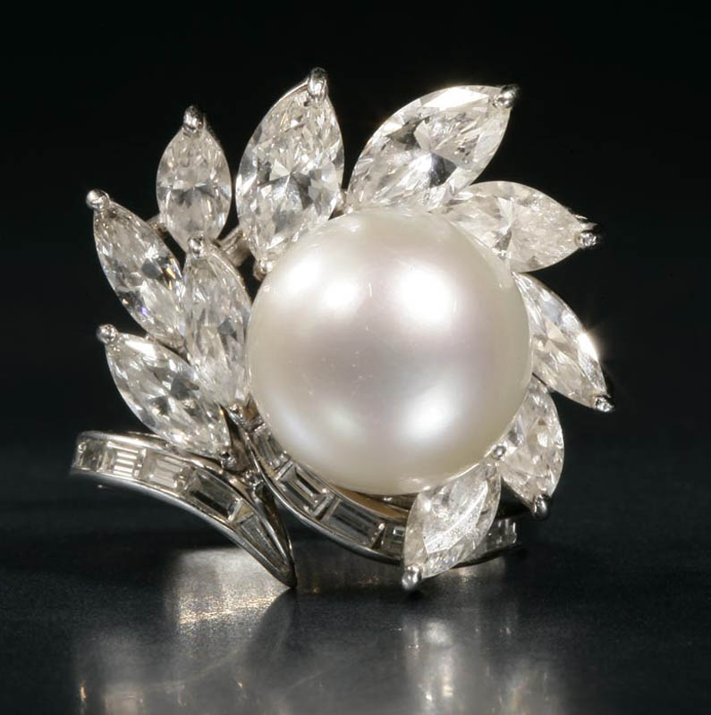 Appraisal: A platinum cultured pearl and diamond ring A platinum cultured