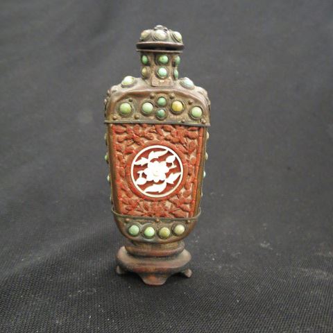 Appraisal: Chinese Carved Cinnabar Snuff Bottle turquoise Jewels on ivory floral