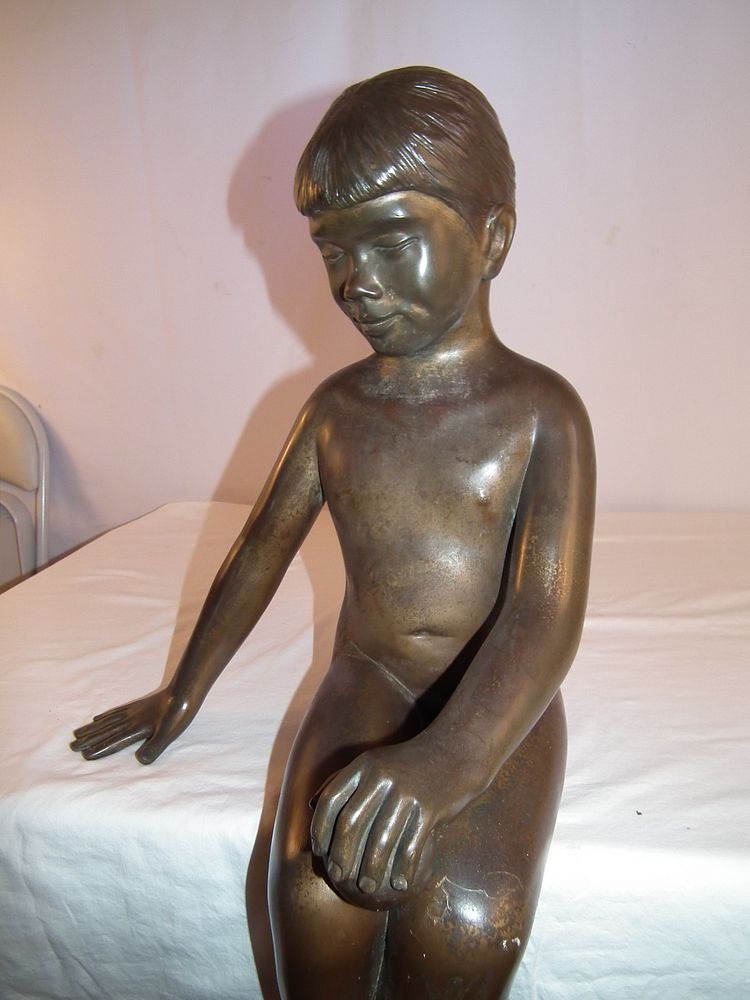 Appraisal: SINGER FOUNDRY BRONZE GIRL Old bronze figure of a seated