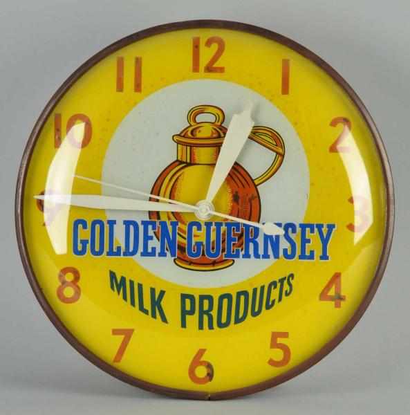 Appraisal: Electric Golden Guernsey Milk Light-Up Clock Description Circa s Made