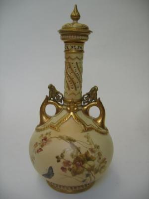 Appraisal: A ROYAL WORCESTER TWO HANDLED VASE AND COVER c of