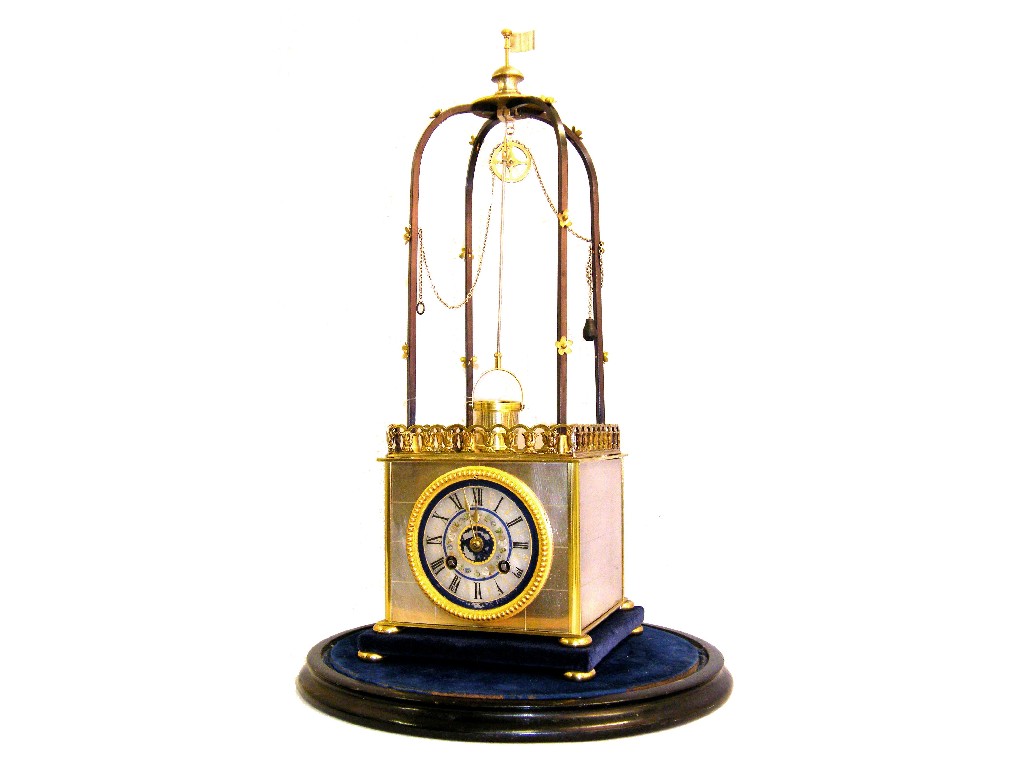 Appraisal: French novelty two train well clock the movement with outside