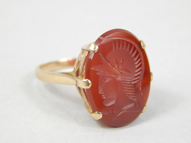 Appraisal: A ct intaglio ring with carved head g all in