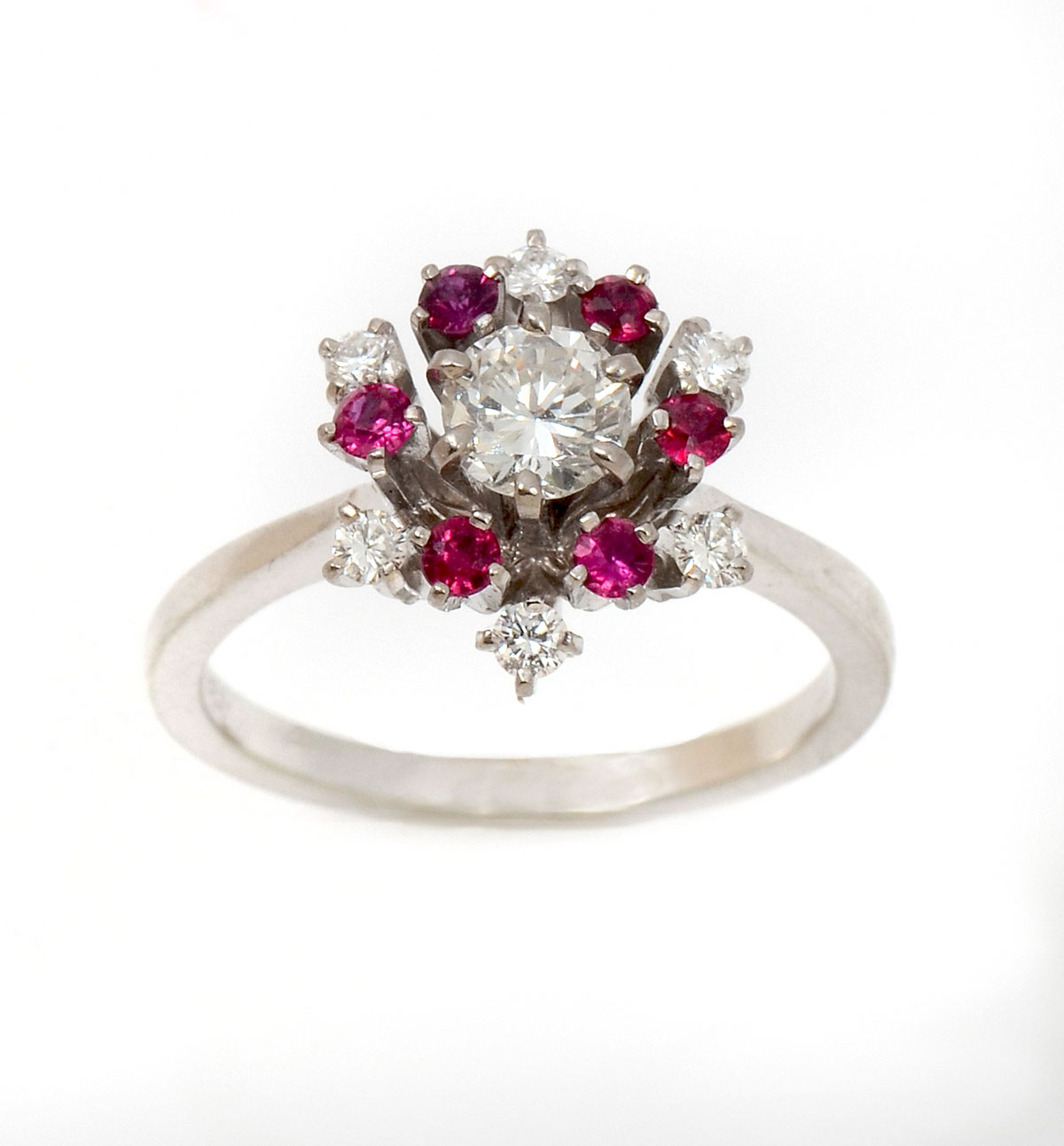 Appraisal: K RUBY DIAMOND RING One round brilliant cut diamond approx