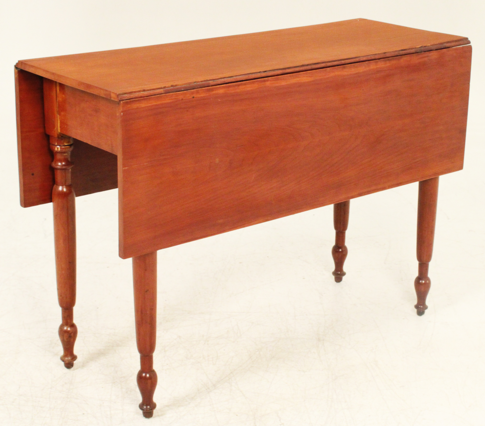 Appraisal: AMERICAN CHERRY DROP LEAF TABLE American cherry drop leaf table