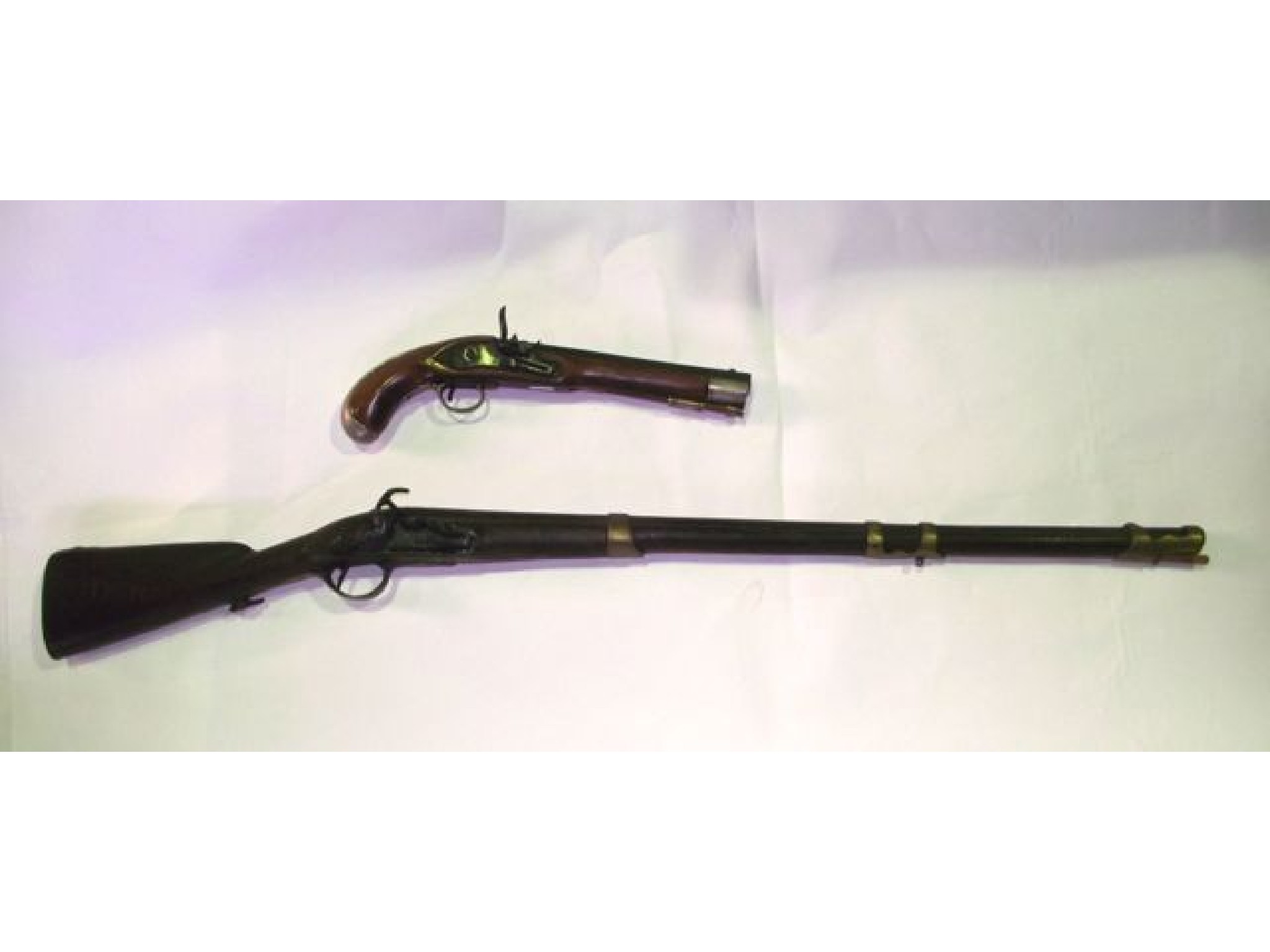 Appraisal: An antique flintlock rifle with timber stock bearing incised mark