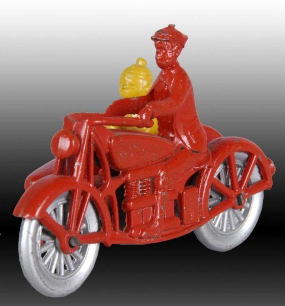 Appraisal: Tootsie Toy Smitty Motorcycle Toy Description Die cast Figure in