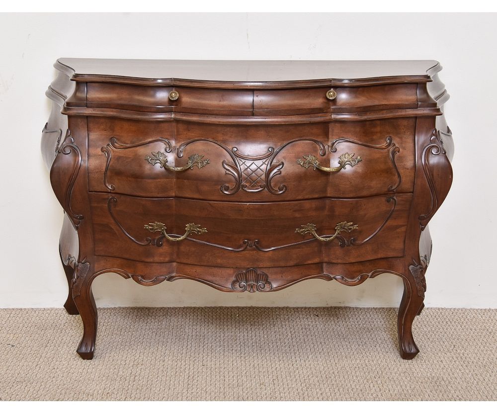 Appraisal: French Style Bombe Chest French style cherry bombe chest circa