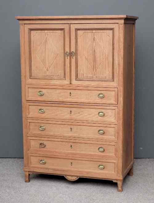 Appraisal: A late th Century pitch pine millinery cabinet by C