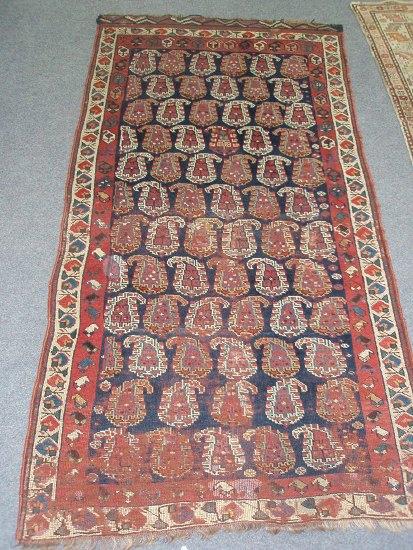 Appraisal: A Hamadan rug with blue ground central field decorated boteh