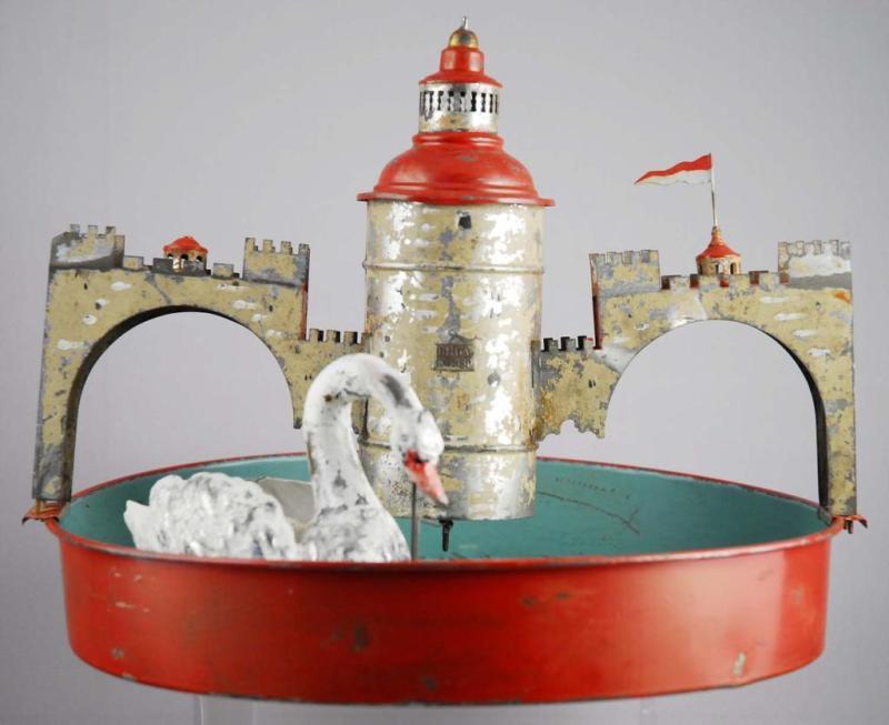 Appraisal: Tin Wind-Up Swan Pond Toy Description German Working When wound