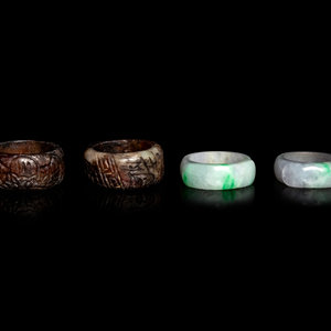 Appraisal: Two Chinese Jadeite Archer's Rings and A Pair of Chinese